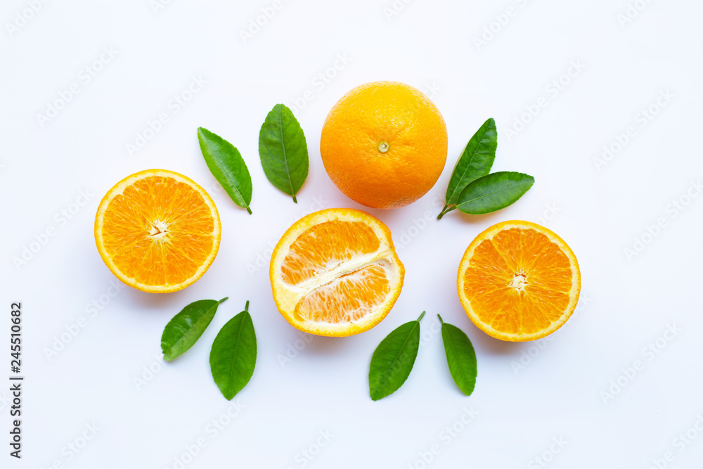 Fototapeta premium High vitamin C. Fresh orange citrus fruit with leaves isolated on white