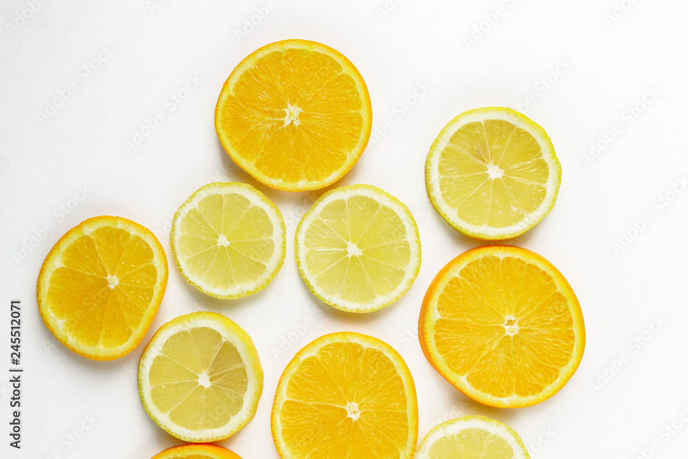 citrus slice, oranges and lemons isolated on white background