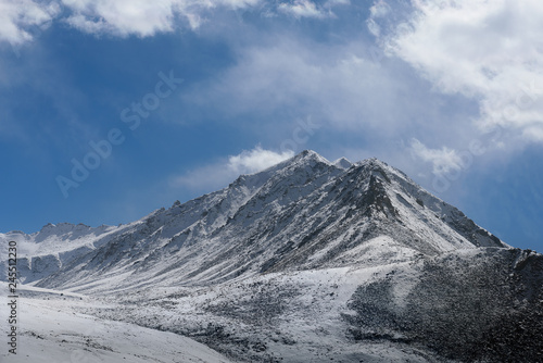 The snow mountain with daylight and blue sky