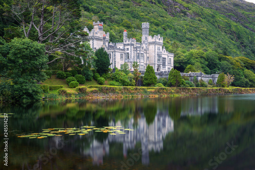 Kylemore Abbey in Ireland with reflections in the Pollacapall Lough