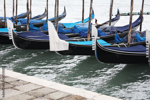 Gondolas in Venice Italy Adriatic sea. Markusdom. St Mark's Basilica Square. Saint Marco Square. © Malira
