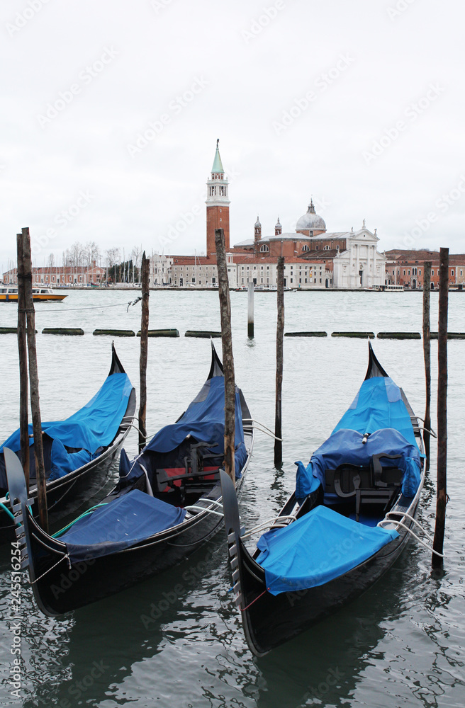 Gondolas in Venice Italy Adriatic sea. Markusdom. St Mark's Basilica Square. Saint Marco Square.