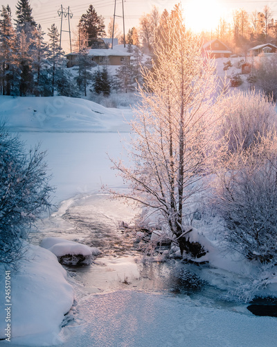 Snowy Winter river sunrise