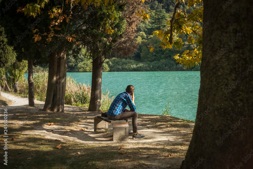 Εκτύπωση καμβά Handsome Man Sit by Lake