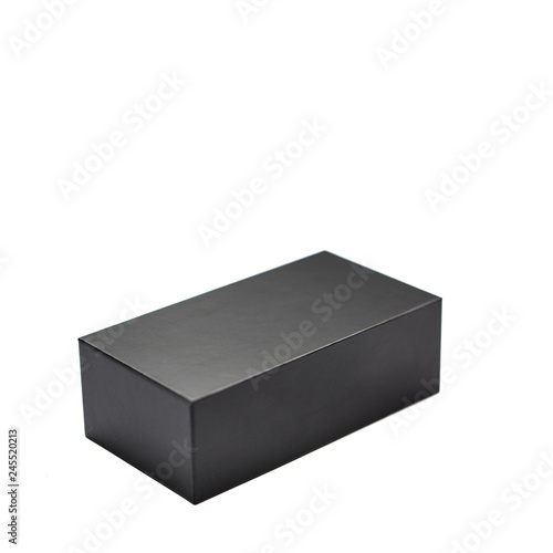Closed black box of textured cardboard on white background. Isolated..