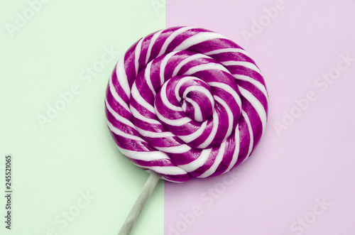 beautiful purple lollipop on a background