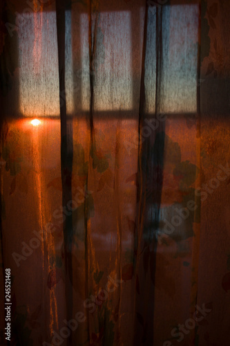 bright dawn through a transparent curtain