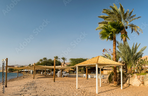 Morning at a public beach in Eilat - number one tourist resort and recreational city in Israel