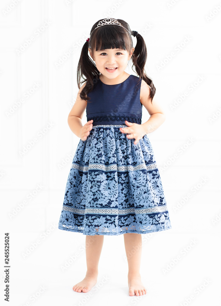 happy little girl stands on white background happy little girl stands on white background