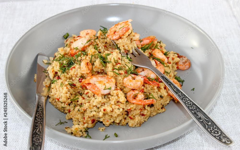 Grits cous cous with vegetables and grilled shrimp Grits cous cous with vegetables and grilled shrimp
