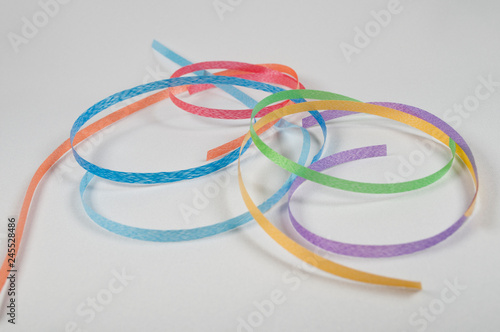 Seven multicolored ribbons, a combination of colors of the rainbow