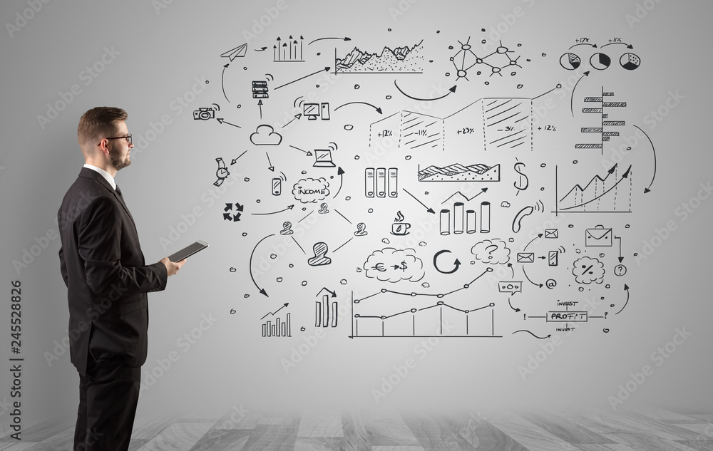 Manager staying and presenting office affairs for someone with graphs, icons reports around
