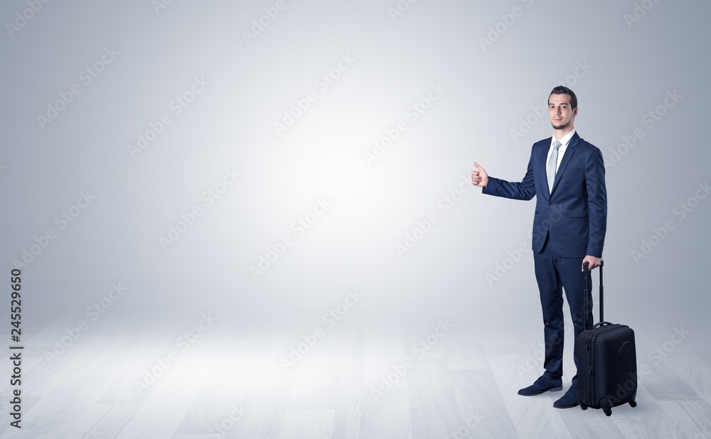 Lonely businessman hitchhikes concept with copy space around him
Lonely businessman hitchhikes concept with copy space around him