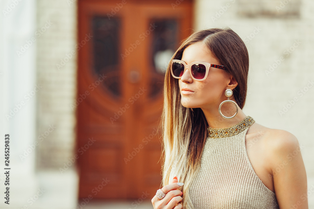 Summer fashionable portrait of young professional beauty model. Lifestyle, happiness, glamour concept