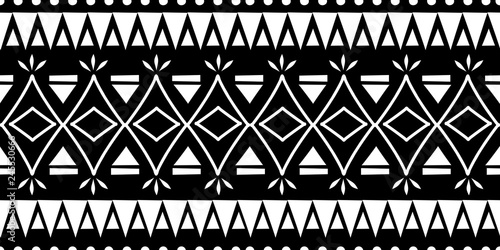 Tribal ethnic seamless pattern with black and white colors. Background traditional symbol drawing for fashion textile print and wrapping.