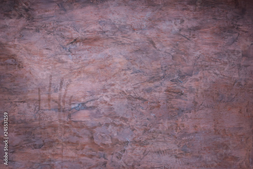 Abstract wall fragment stucco with scratches and cracks .Texture of painted brown old grunge concrete wall for background