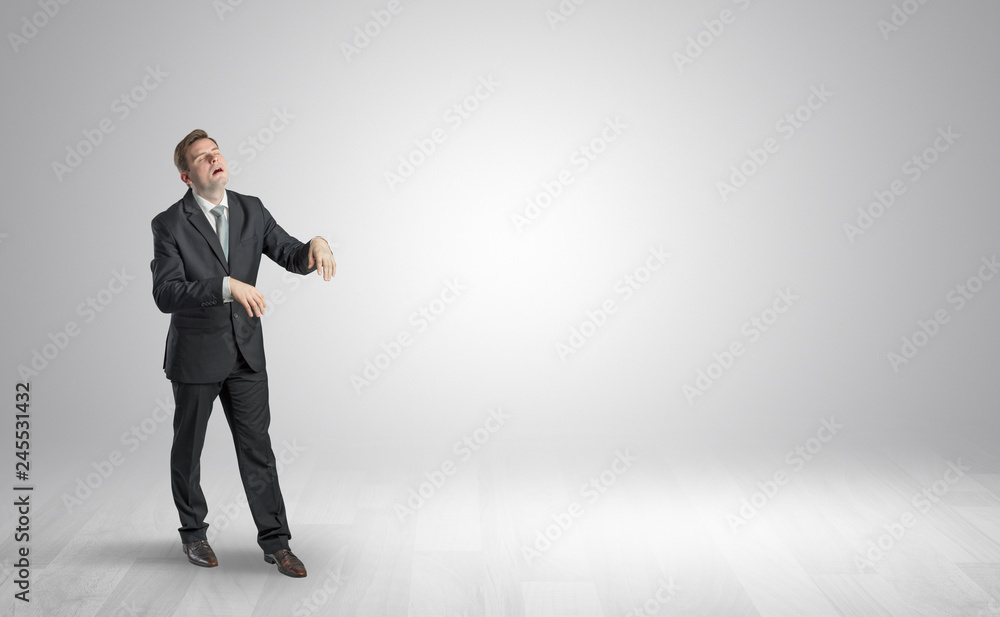Zombi, sleepy maniac businessman walking in a copy space
Zombi, sleepy maniac businessman walking in a copy space
