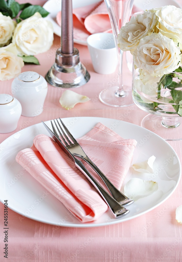 Festive table setting for Valentins Day, Easter, Mother's Day ore wedding. Elegant table decoration with fresh roses. Festive table setting for Valentins Day, Easter, Mother's Day ore wedding. Elegant table decoration with fresh roses.