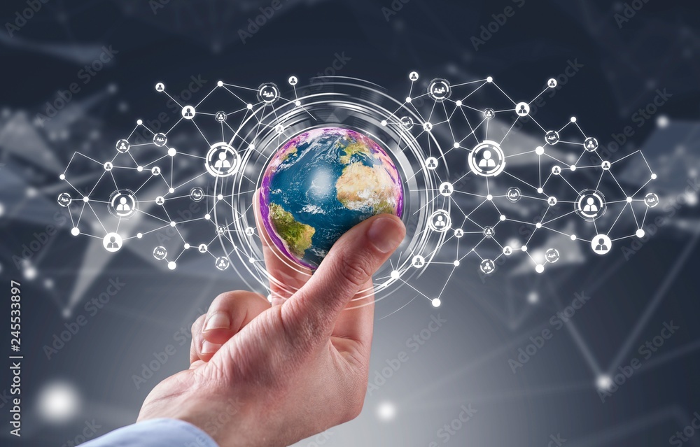 Businessman holding globe with social media network icons structure Businessman holding globe with social media network icons structure
