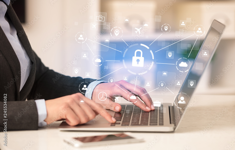 Business woman below chest working on laptop in a cozy homey environment with secured connection concept
Business woman below chest working on laptop in a cozy homey environment with secured connection concept
