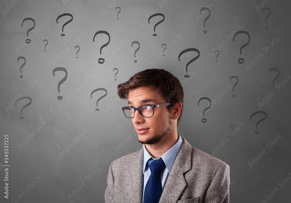 Person with question marks around face
Person with question marks around face