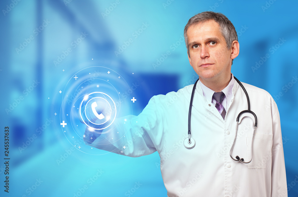 Doctor touching blue screen with call center concept
Doctor touching blue screen with call center concept