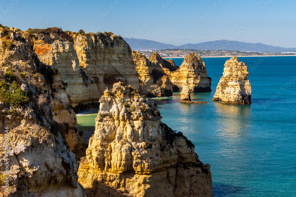 Beautiful panoramic sea view over rocks and cliffs in the Atlantic Ocean at Ponta da Piedade, Algarve region, Portugal Beautiful panoramic sea view over rocks and cliffs in the Atlantic Ocean at Ponta da Piedade, Algarve region, Portugal