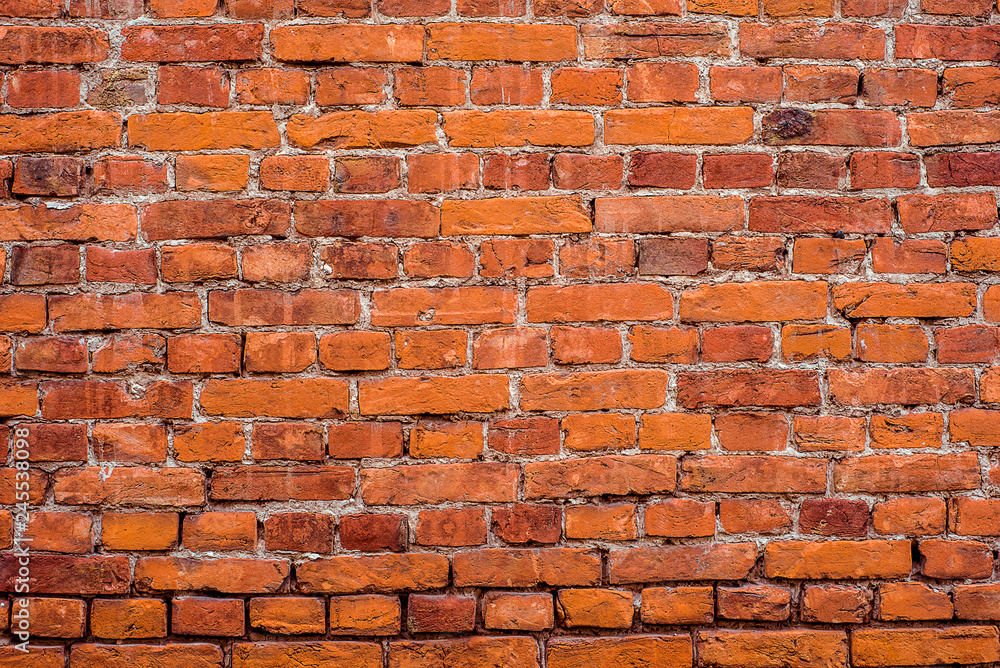 Fototapeta premium Empty Vintage Red Brick Wall Texture. Building Facade With Grunge Damaged