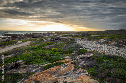 Beatiful sunset at Cape Agulhas, southernmost point of Africa