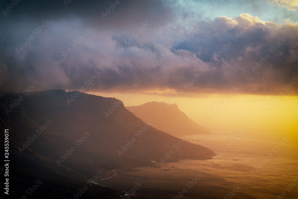 Fototapeta premium Lion's head top view at sunset with beatiful clouds in the sky