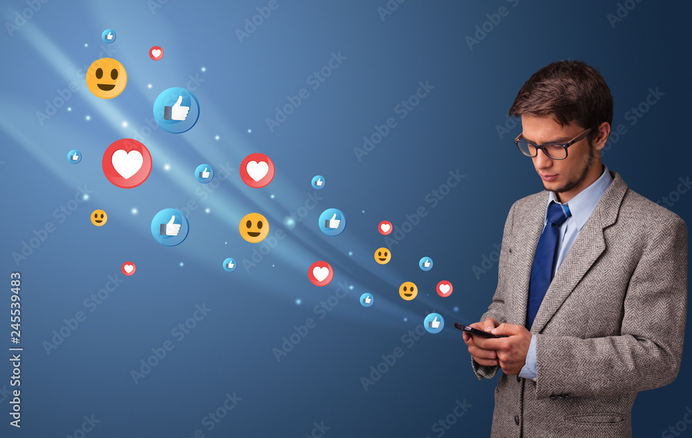 custom made wallpaper toronto digitalYoung person using smartphone with flying social media icons around
