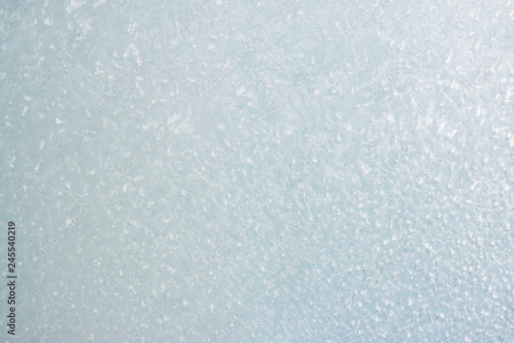 Frozen winter abstract background on the window glass with copy space Frozen winter abstract background on the window glass with copy space