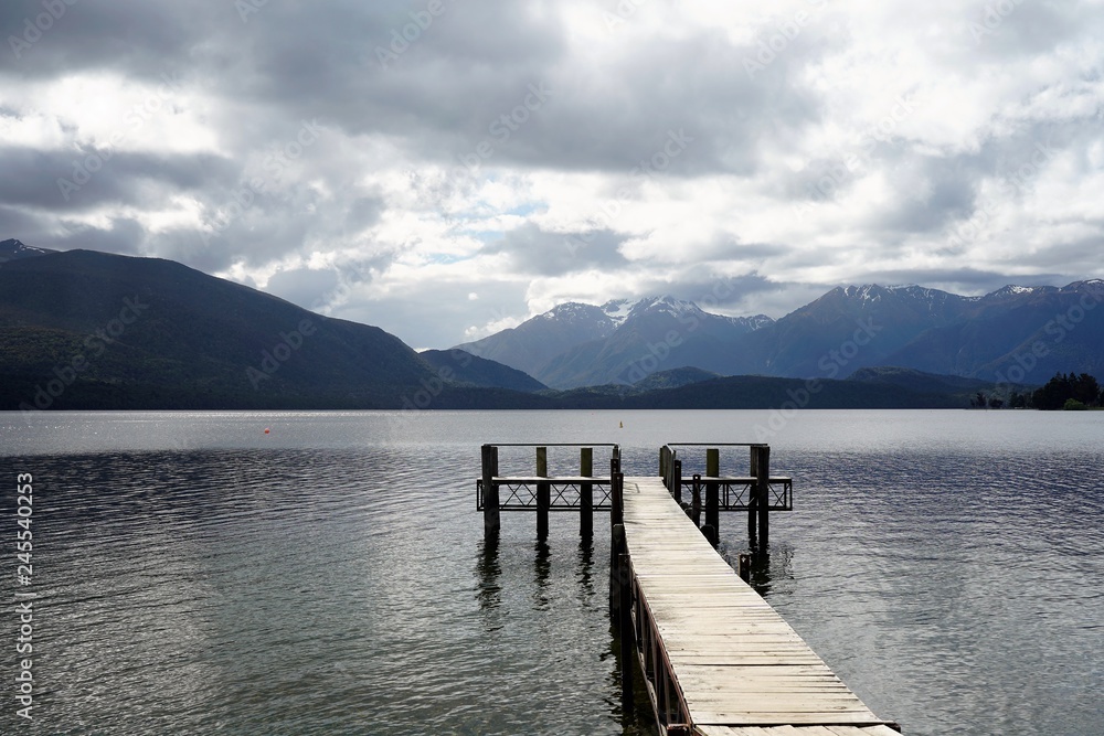 Wooden jetty on the lake in the mountains, New Zealand, South Island 