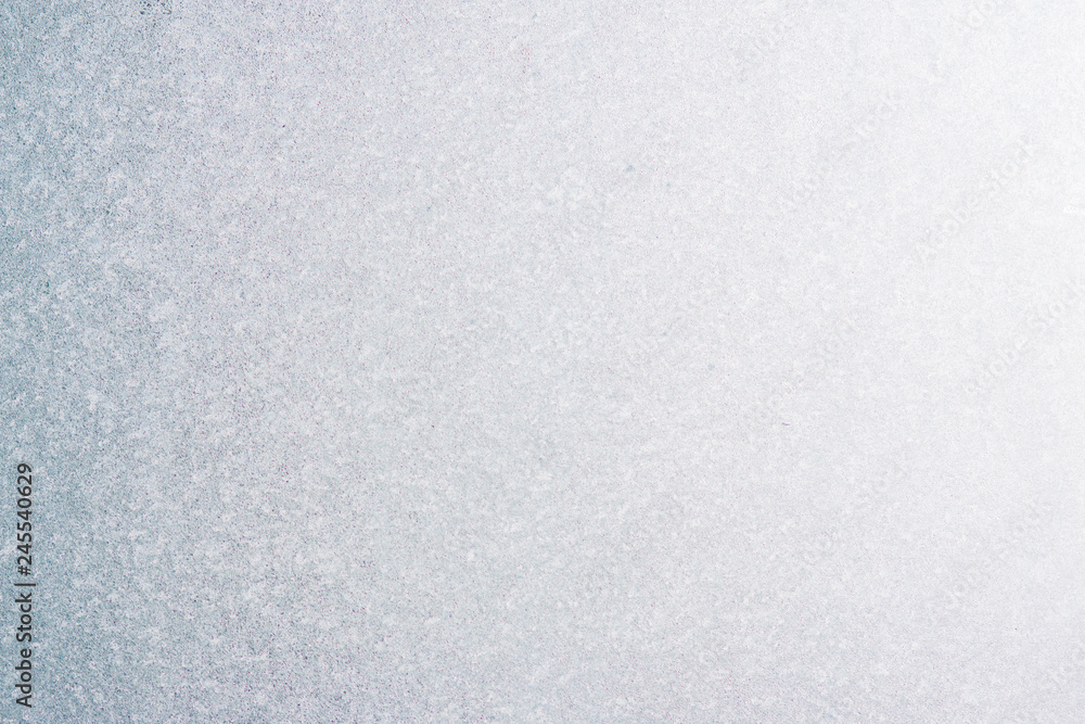 Frozen winter abstract background on the window glass with copy space Frozen winter abstract background on the window glass with copy space