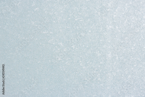 Ice background, frozen water with glass. Winter texture. Copy space.