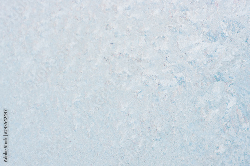 Ice background, frozen water with glass. Winter texture. Copy space
