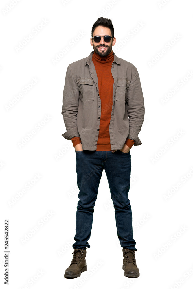 Full-length shot of Handsome man with beard with glasses and happy on isolated white background Full-length shot of Handsome man with beard with glasses and happy on isolated white background