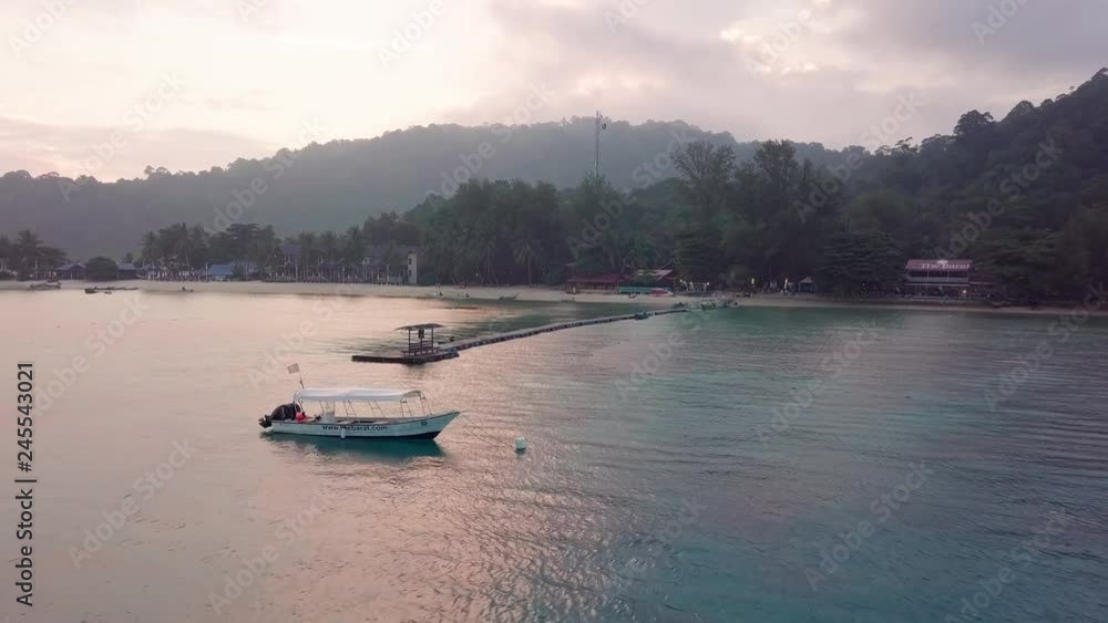 Aerial view of boats and crystal clear waters at Perhentian Islands (Pulau Perhentian) Aerial view of boats and crystal clear waters at Perhentian Islands (Pulau Perhentian)