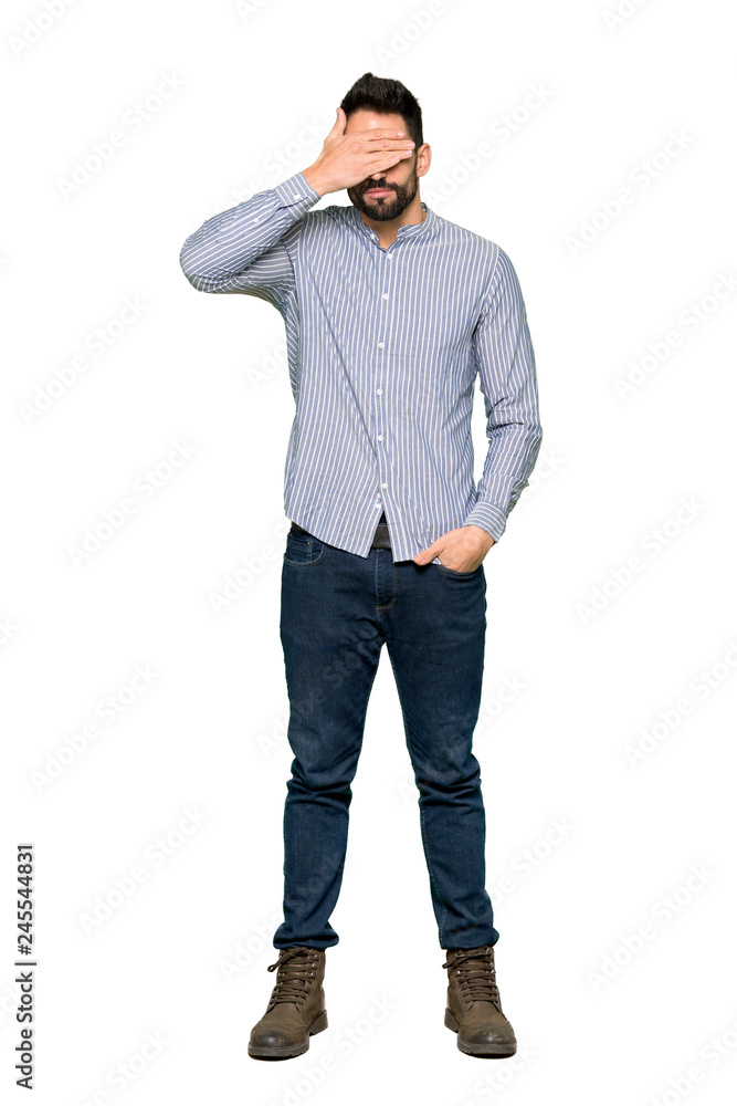 Full-length shot of Elegant man with shirt covering eyes by hands. Do not want to see something on isolated white background Full-length shot of Elegant man with shirt covering eyes by hands. Do not want to see something on isolated white background