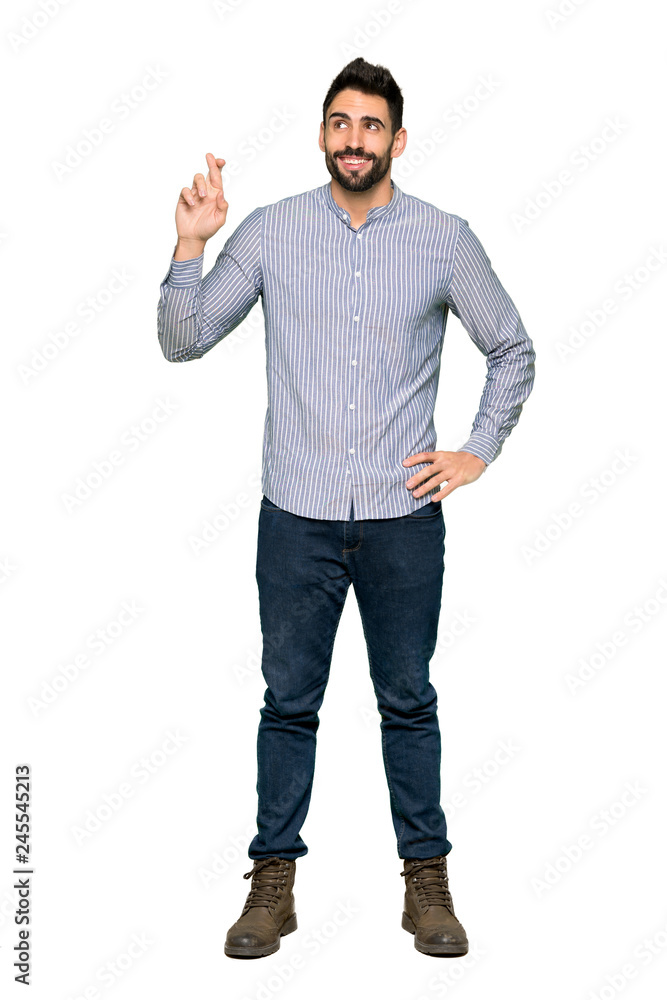 Full-length shot of Elegant man with shirt with fingers crossing and wishing the best on isolated white background Full-length shot of Elegant man with shirt with fingers crossing and wishing the best on isolated white background