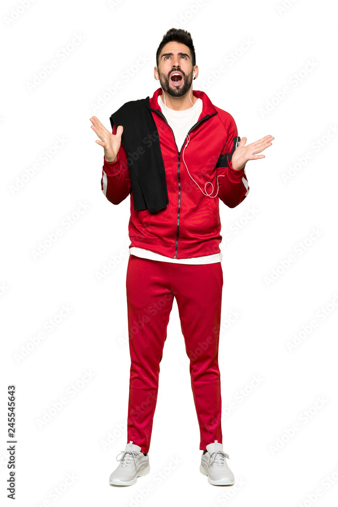 Full-length shot of Handsome sportman frustrated by a bad situation on isolated white background Full-length shot of Handsome sportman frustrated by a bad situation on isolated white background