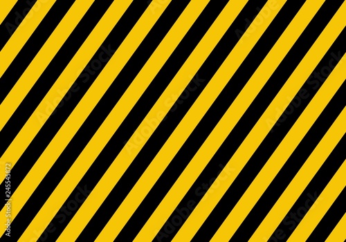 Warning yellow sign with black rectangular lines. Abstract backdrop with diagonal black and yellow strips. Danger zone background