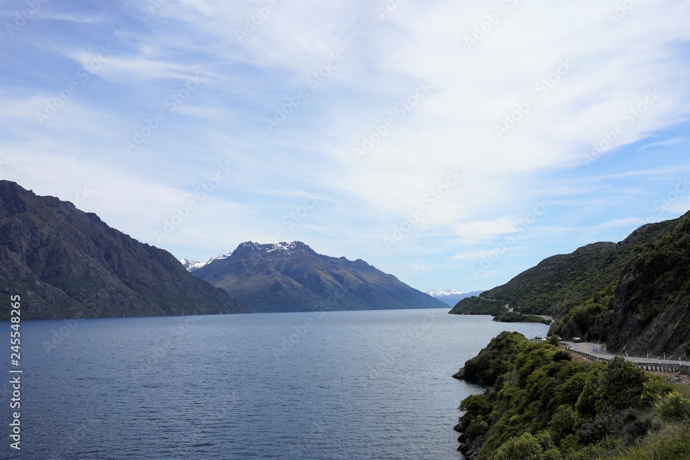A road by the lake in the mountains, New Zealand South Island A road by the lake in the mountains, New Zealand South Island