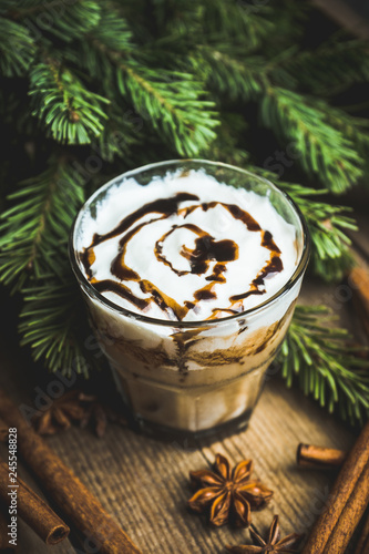 Sweet creamy latte on rustic background. Selective focus. Shallow depth of field.