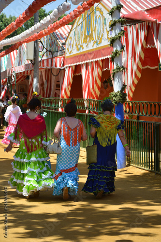 beautiful colors of flamenco dresses at the Feria de Abril in Seville