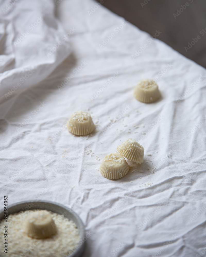 Vegan White chocolate pralines or candy with coconut Vegan White chocolate pralines or candy with coconut