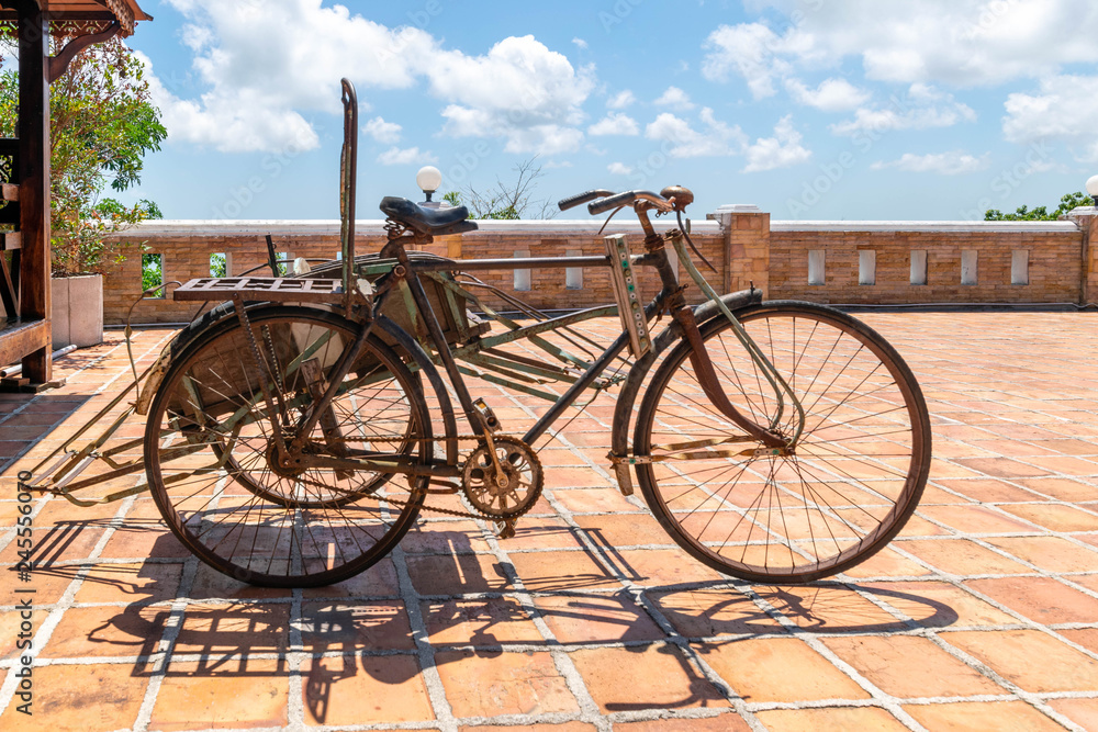 Old-fashioned, retro tricycle. vintage trishaw. traditional rickshaw.