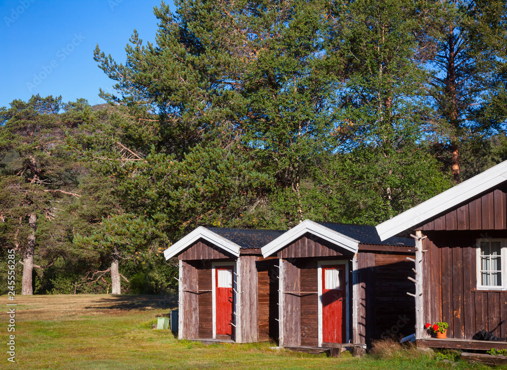 Fototapeta premium Wooden camping cabins at a campsite in Norway Scandinavia