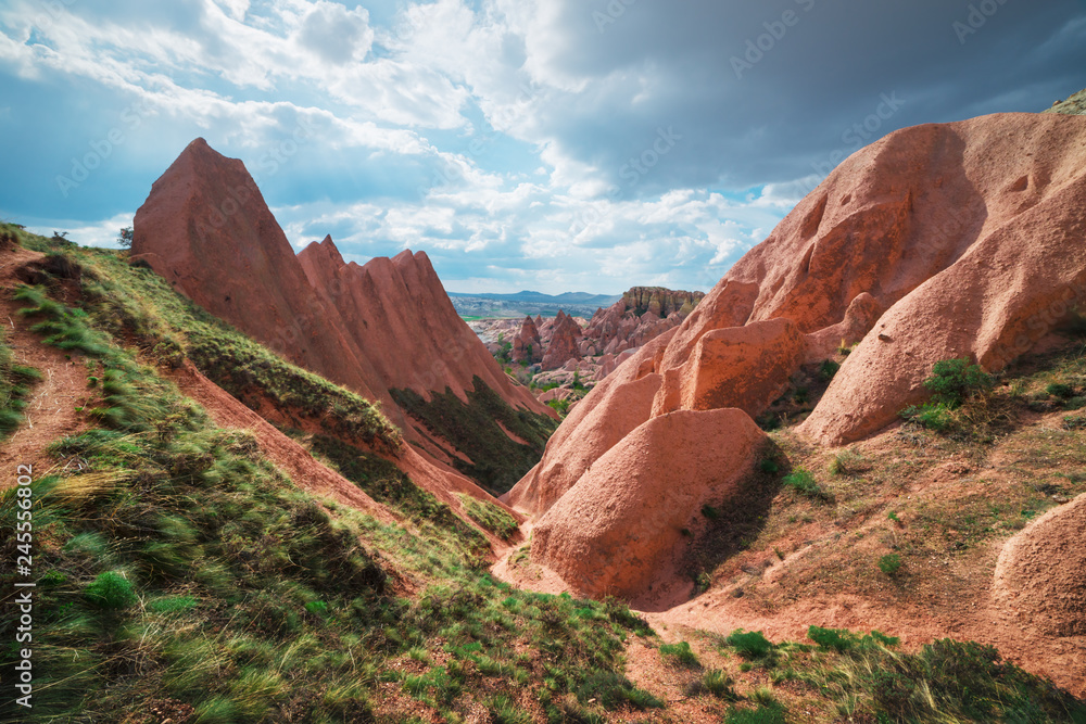 Fototapeta premium Amazing sunrise in Cappadocia mountains, Turkey. Landscape photography