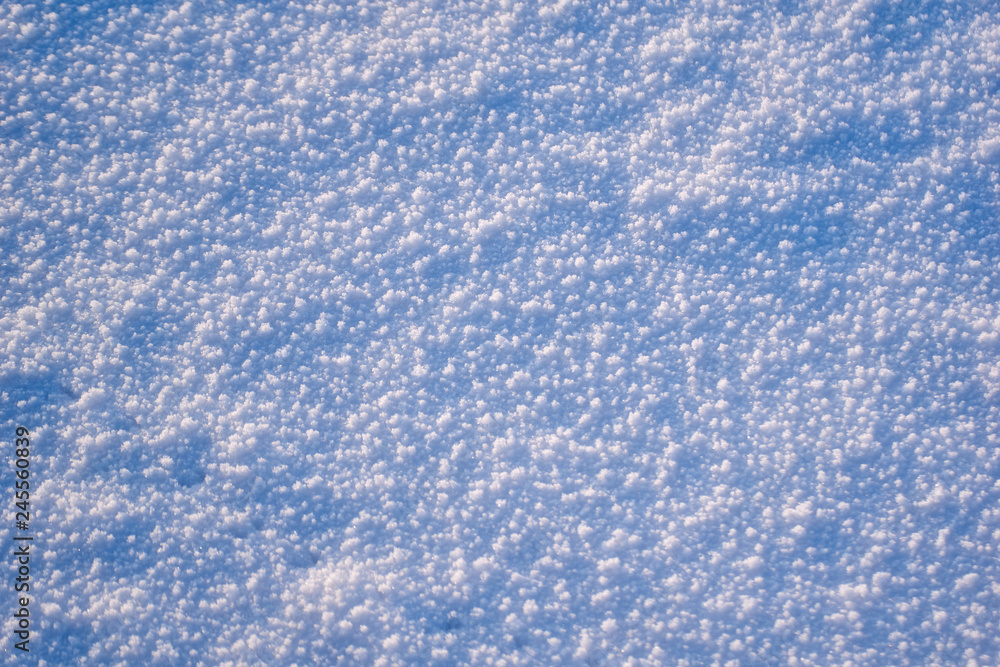 texture of white winter snow with blue tint winter background texture of white winter snow with blue tint winter background